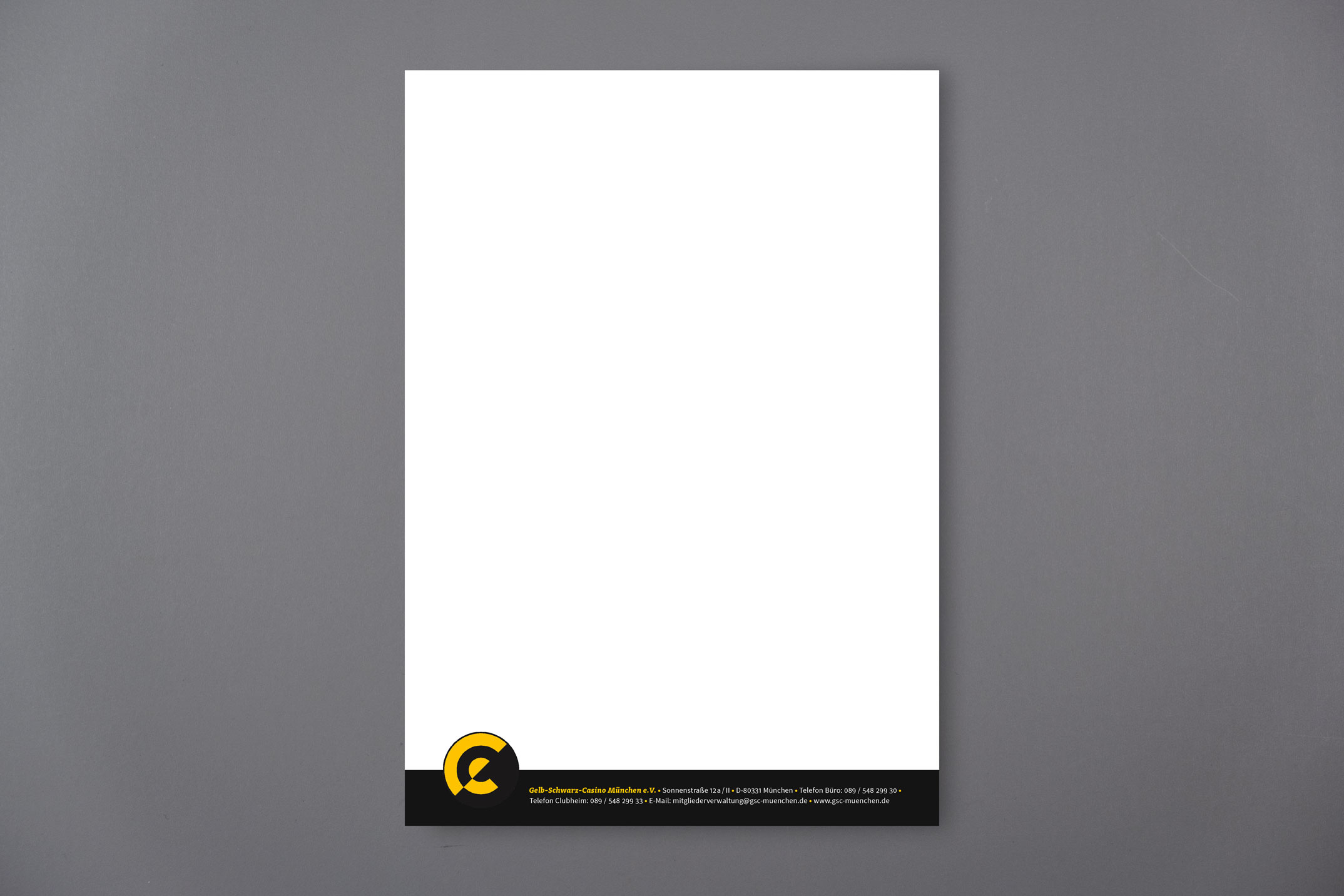 Briefpapier – Corporate Design Gelb-Schwarz-Casino München